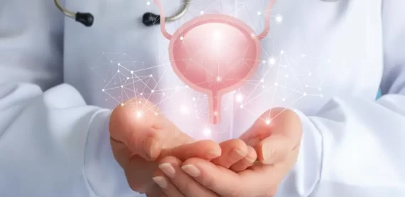 Doctor holding a digital illustration of the bladder – Bladder Cancer in Elderly Patients care concept